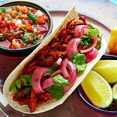  Cochinita Pibil:  Yoğun Bir Acı ile Dans Eden Domuz Eti ve Şımartıcı Limon Sarışını!